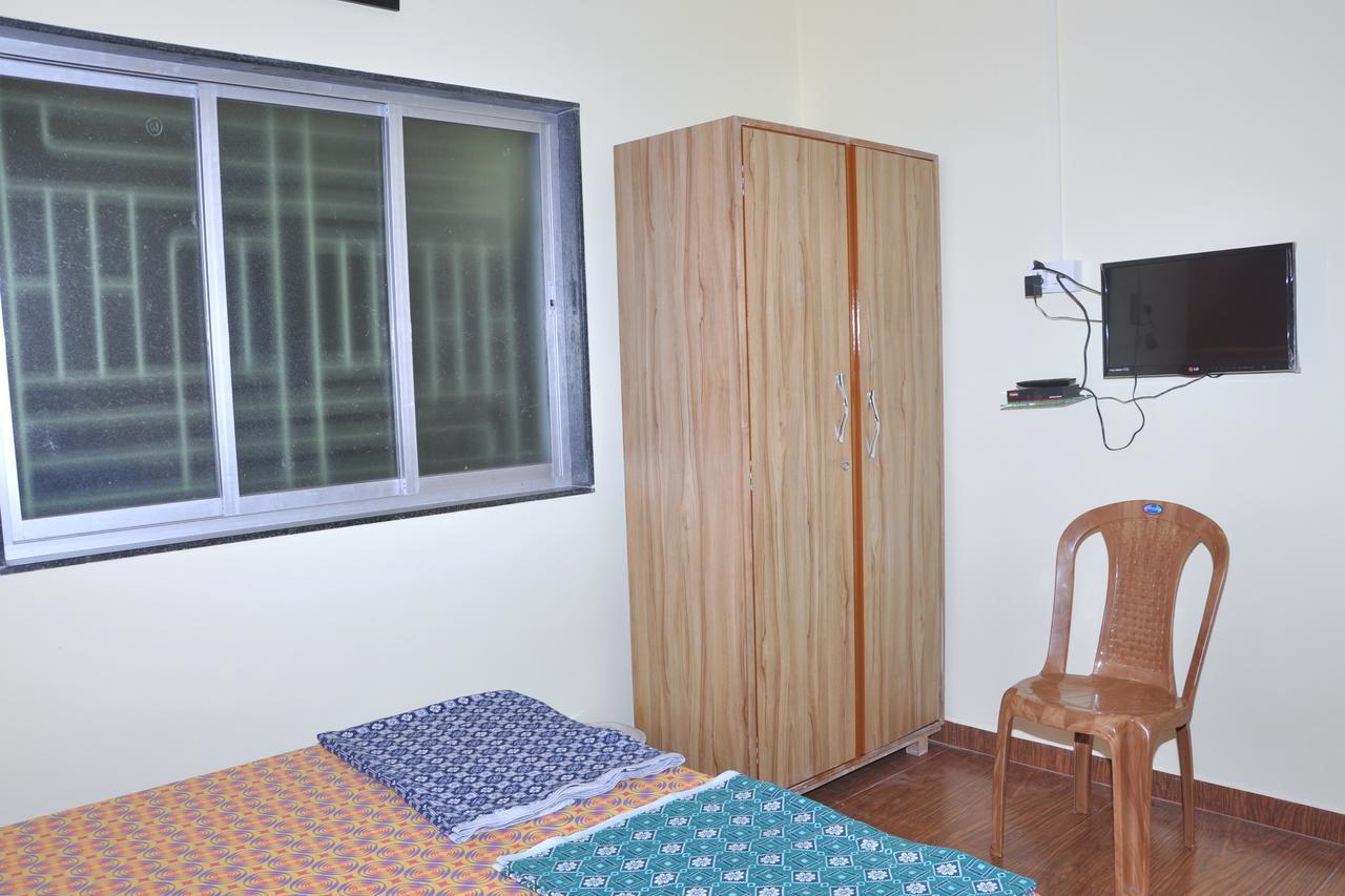 Hotel Anjali Lodge Mālvan Buitenkant foto